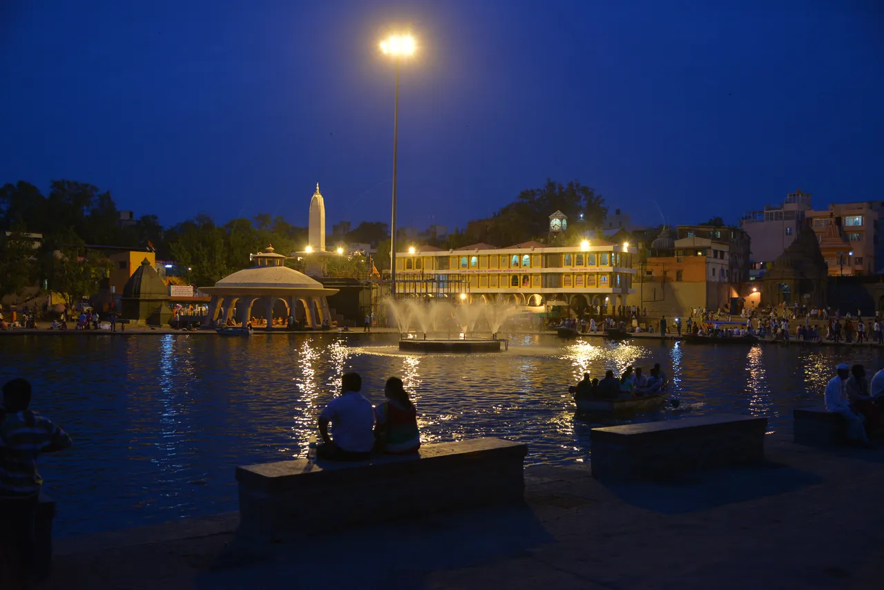 Evening lights reflected in the Godavari river at Goda Ghat, Nashik